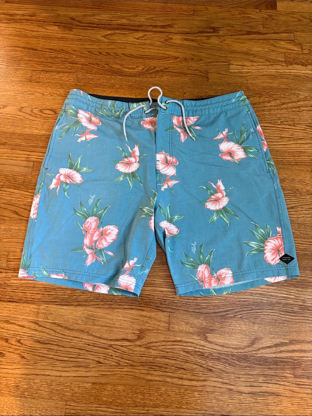 Rip Curl Teal Swim Board Shorts with Pink Floral Print